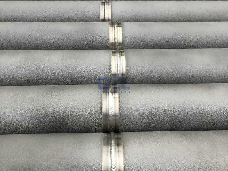 14 welds of spun cast tubes