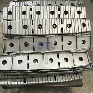 Investment cast plates for furnace