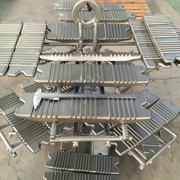 Investment cast plates for furnace
