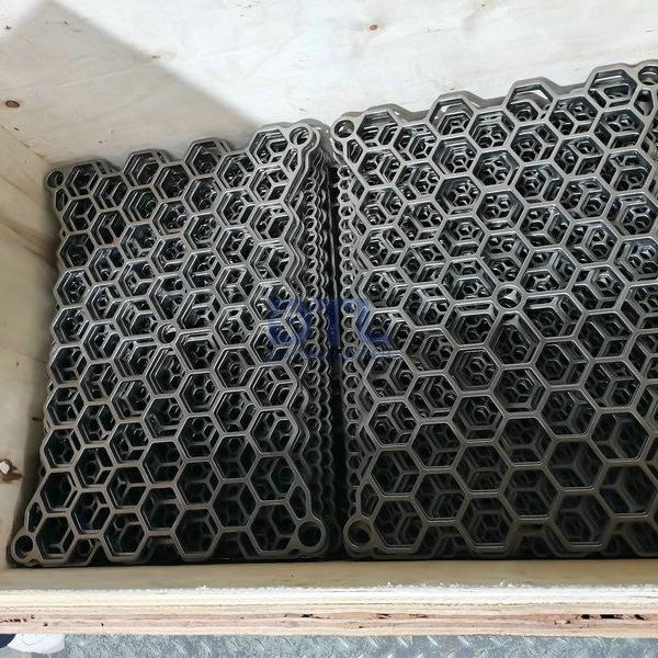Investment cast alloy steel grids