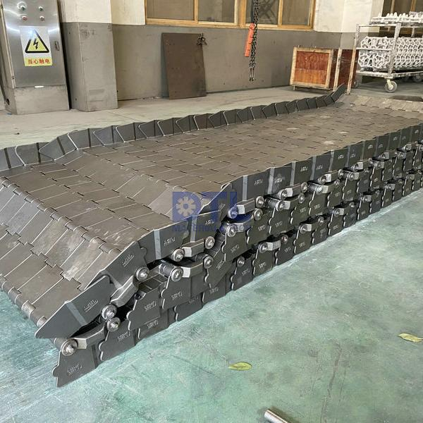 Cast link belt assembly