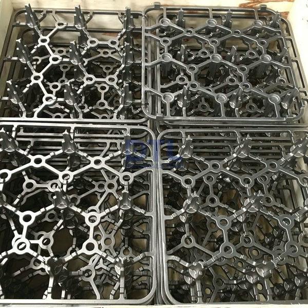 Investment cast alloy steel grids
