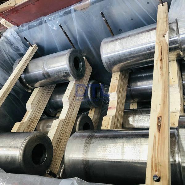 Alloy cast charging and discharging rolls