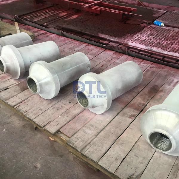 Alloy cast charging and discharging rolls
