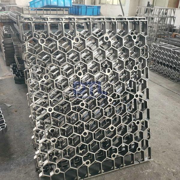 Investment cast alloy steel grids